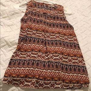 Multi colored sleeveless top.